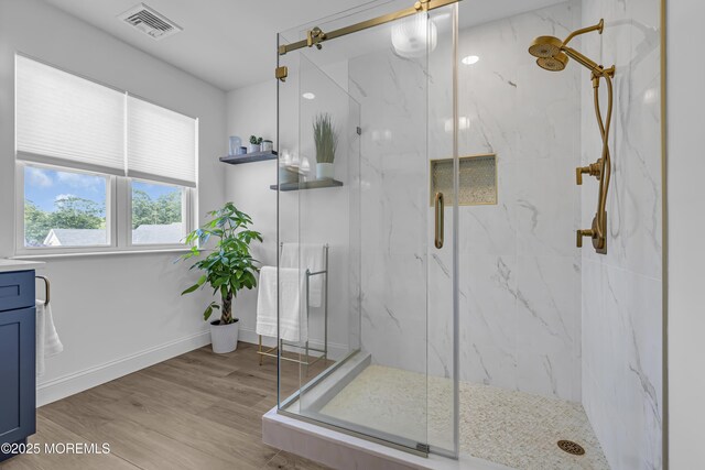 22 Ernest Dr, Lanoka Harbor, NJ 08734 - bathroom with a marble finish shower, wood finished floors, and baseboards