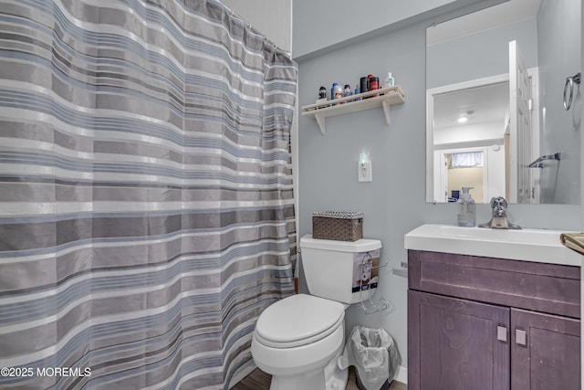 22 Ernest Dr, Lanoka Harbor, NJ 08734 - bathroom with toilet, vanity, and a shower with shower curtain
