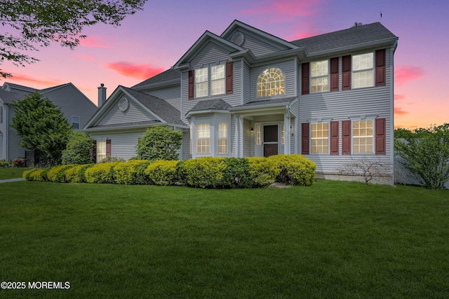 22 Ernest Dr, Lanoka Harbor, NJ 08734 - view of front of home featuring a lawn and a shingled roof