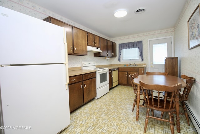 8 Newcastle Ct, Toms River, NJ 08757 - kitchen with white appliances, wallpapered walls, a baseboard heating unit, under cabinet range hood, and light countertops