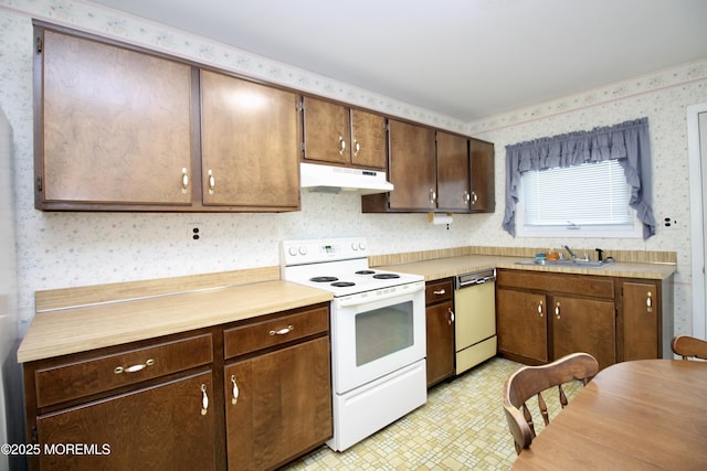 8 Newcastle Ct, Toms River, NJ 08757 - kitchen featuring white range with electric stovetop, under cabinet range hood, dishwashing machine, wallpapered walls, and a sink