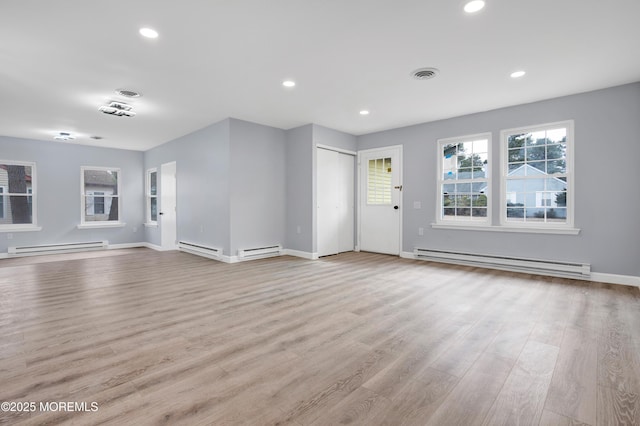 4B Greenwood Ln, Whiting, NJ 08759 - unfurnished living room with baseboard heating, a baseboard radiator, wood finished floors, and recessed lighting