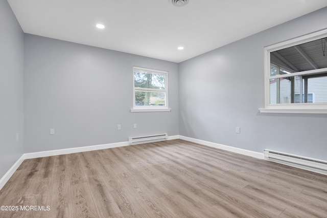 4B Greenwood Ln, Whiting, NJ 08759 - spare room featuring baseboard heating, light wood finished floors, baseboards, and recessed lighting