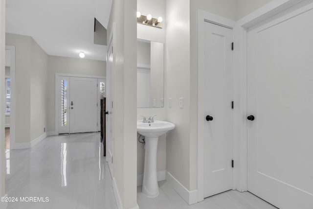 24 Golders Green Rd, Lakewood, NJ 08701 - bathroom featuring baseboards