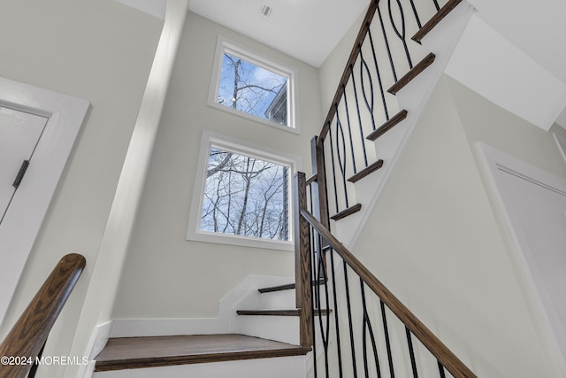 24 Golders Green Rd, Lakewood, NJ 08701 - stairs featuring baseboards and a towering ceiling