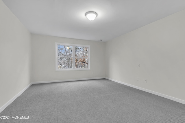 24 Golders Green Rd, Lakewood, NJ 08701 - carpeted empty room featuring baseboards