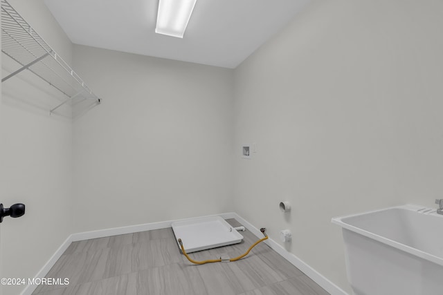 24 Golders Green Rd, Lakewood, NJ 08701 - washroom with gas dryer hookup, hookup for a washing machine, and baseboards
