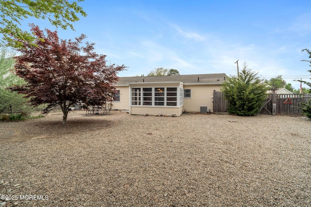 123 Nautilus Dr, Manahawkin, NJ 08050 - rear view of property with a sunroom