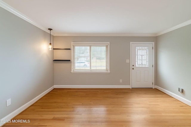 123 Nautilus Dr, Manahawkin, NJ 08050 - foyer with ornamental molding, light wood-style floors, and baseboards