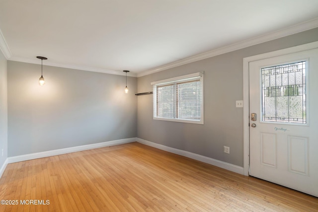 123 Nautilus Dr, Manahawkin, NJ 08050 - foyer entrance with light wood finished floors, baseboards, and crown molding
