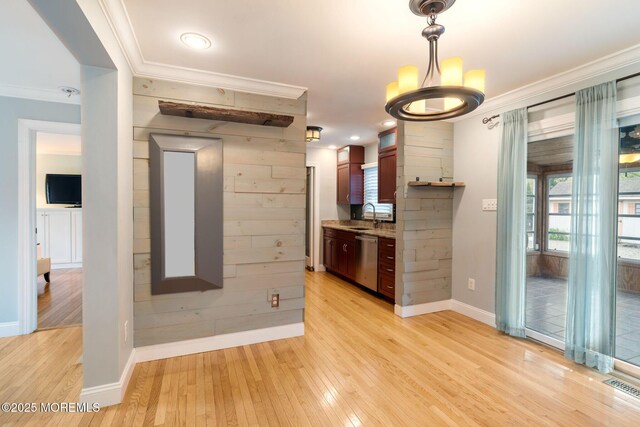 123 Nautilus Dr, Manahawkin, NJ 08050 - kitchen with dishwasher, a sink, light wood-type flooring, baseboards, and a chandelier
