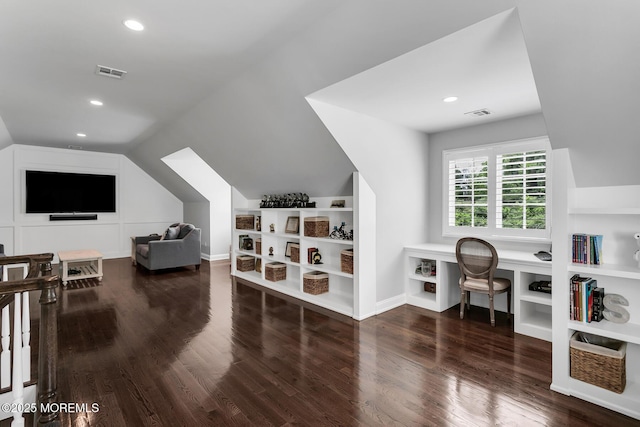 home office with built in features, vaulted ceiling, wood finished floors, recessed lighting, and baseboards