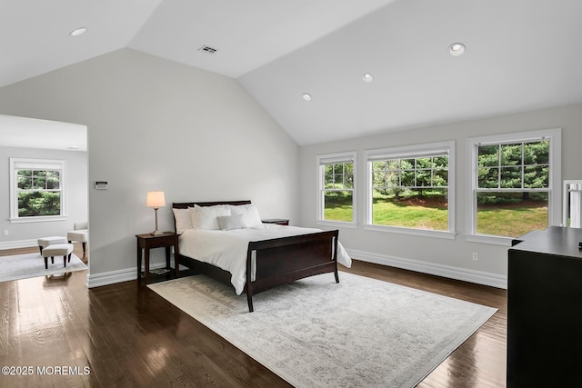 bedroom featuring lofted ceiling, baseboards, dark wood finished floors, and recessed lighting
