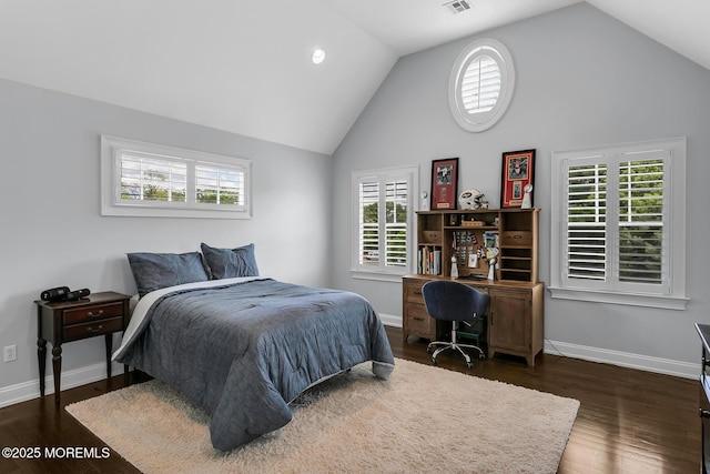 bedroom featuring high vaulted ceiling, baseboards, and dark wood-type flooring