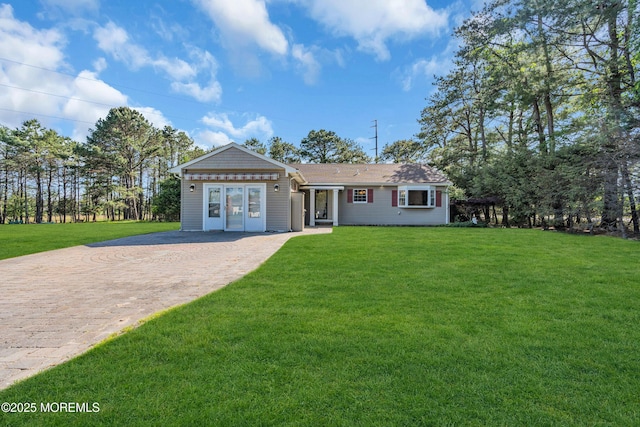 11 S Point Ct, Toms River, NJ 08757 - ranch-style house with a front yard and decorative driveway