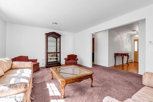 11 S Point Ct, Toms River, NJ 08757 - living room featuring carpet floors, a baseboard heating unit, and baseboards