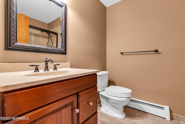 11 S Point Ct, Toms River, NJ 08757 - full bathroom featuring baseboard heating, toilet, a shower with shower door, vanity, and tile patterned floors