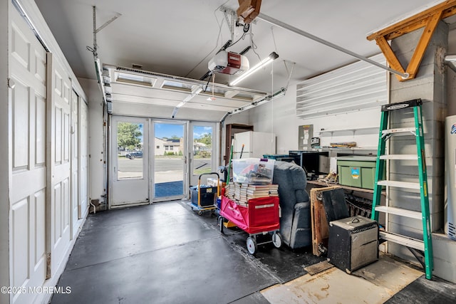 11 S Point Ct, Toms River, NJ 08757 - garage with a garage door opener and freestanding refrigerator