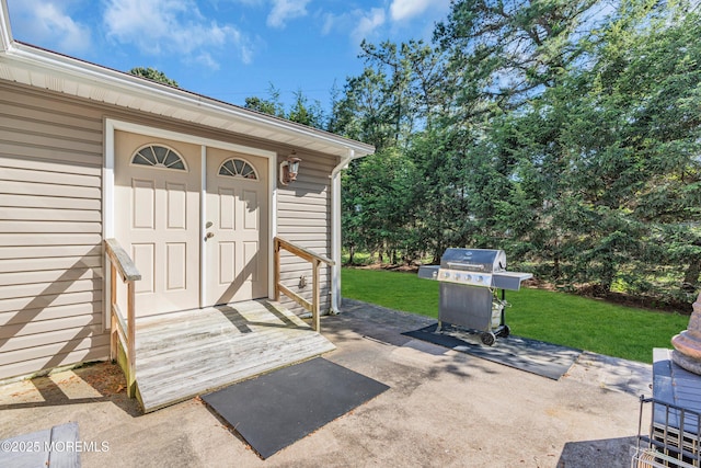 11 S Point Ct, Toms River, NJ 08757 - view of exterior entry featuring a lawn and a patio area