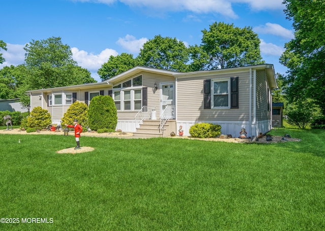 9 Copperfield Dr, Cream Ridge, NJ 08514 - manufactured / mobile home with a front yard and entry steps