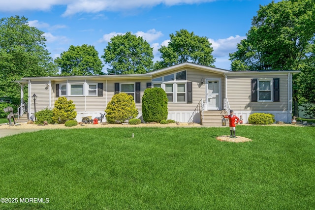 9 Copperfield Dr, Cream Ridge, NJ 08514 - manufactured / mobile home featuring entry steps and a front yard
