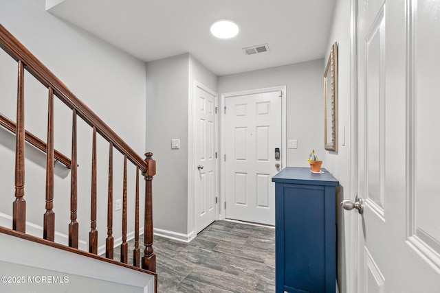 111 Warbler Way Unit 1000, Freehold, NJ 07728 - foyer with dark wood-type flooring, baseboards, and stairway