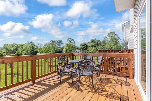 111 Warbler Way Unit 1000, Freehold, NJ 07728 - wooden deck featuring outdoor dining area and view of scattered trees
