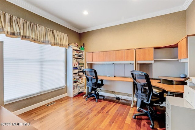 home office featuring ornamental molding, light wood-style flooring, recessed lighting, and baseboards