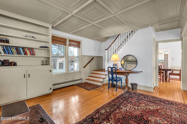 58 River Ave, Island Heights, NJ 08732 - foyer featuring a baseboard radiator, light wood-style flooring, stairway, and a wainscoted wall