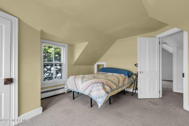 58 River Ave, Island Heights, NJ 08732 - bedroom with a baseboard heating unit, carpet, vaulted ceiling, and baseboards