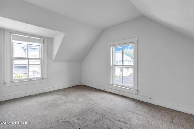 58 River Ave, Island Heights, NJ 08732 - additional living space with vaulted ceiling, carpet, and baseboards