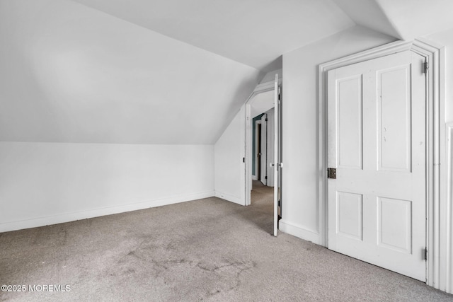 58 River Ave, Island Heights, NJ 08732 - additional living space with vaulted ceiling, carpet, and baseboards