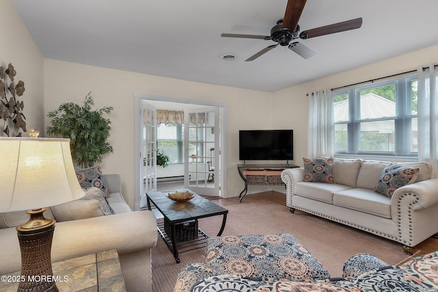 2A Jackson Ct, Whiting, NJ 08759 - living room featuring healthy amount of natural light, a ceiling fan, and baseboards