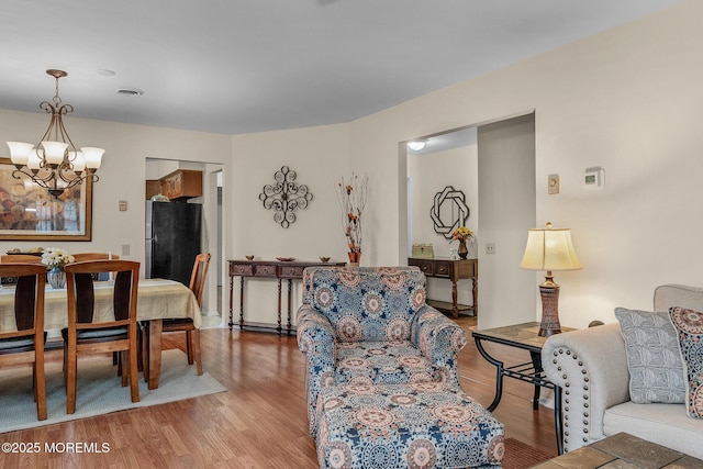 2A Jackson Ct, Whiting, NJ 08759 - living room featuring a chandelier and wood finished floors