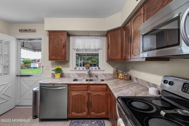 2A Jackson Ct, Whiting, NJ 08759 - kitchen featuring stainless steel appliances, a sink, light countertops, and healthy amount of natural light