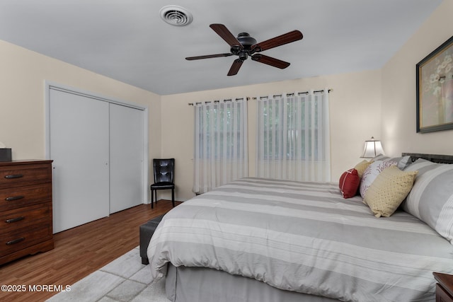 2A Jackson Ct, Whiting, NJ 08759 - bedroom featuring wood finished floors, a closet, and a ceiling fan