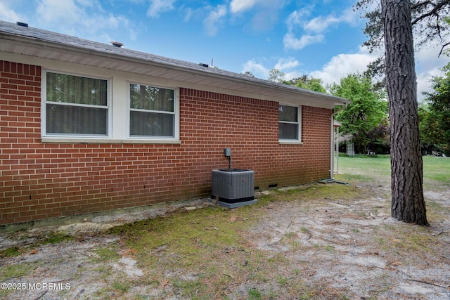 2A Jackson Ct, Whiting, NJ 08759 - view of home's exterior featuring central air condition unit and brick siding