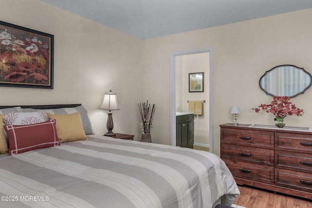 2A Jackson Ct, Whiting, NJ 08759 - bedroom with light wood-style flooring and connected bathroom