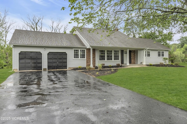 92 Sargent Rd, Freehold, NJ 07728 - view of front of home with a garage, driveway, and a front lawn