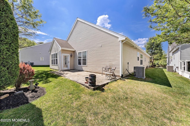 7 Spring Lake Ct, Barnegat, NJ 08005 - back of property featuring central AC, a patio, and a yard