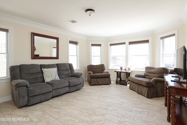 living area featuring ornamental molding, light marble finish floors, and baseboards