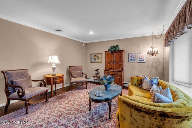 living room with wood finished floors, baseboard heating, ornamental molding, baseboards, and recessed lighting