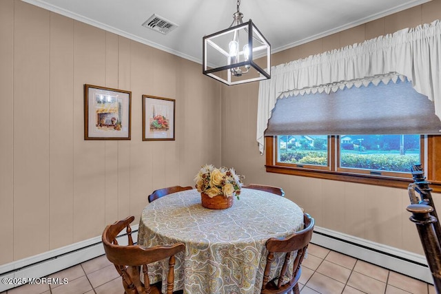 dining space featuring baseboard heating, light tile patterned flooring, a chandelier, and ornamental molding