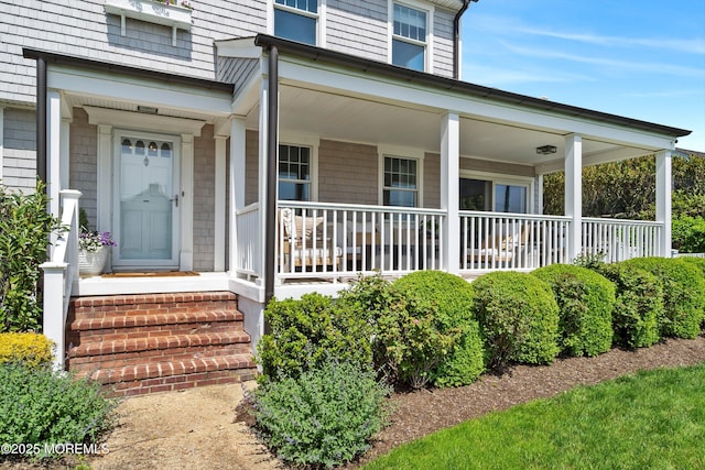 entrance to property with covered porch
