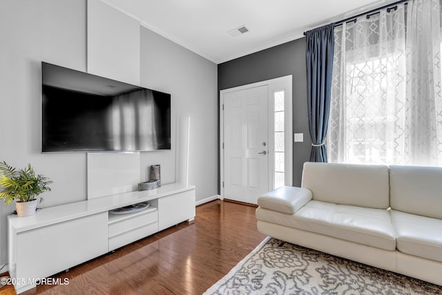 7 Samantha Dr, Tinton Falls, NJ 07712 - living room featuring wood finished floors and ornamental molding
