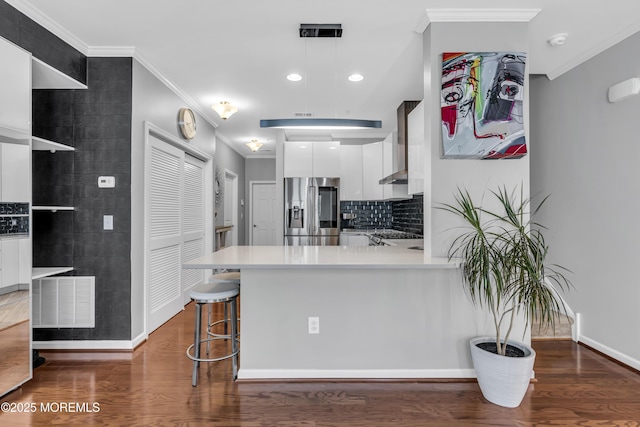 7 Samantha Dr, Tinton Falls, NJ 07712 - kitchen featuring stainless steel fridge with ice dispenser, white cabinets, baseboards, modern cabinets, and wood finished floors