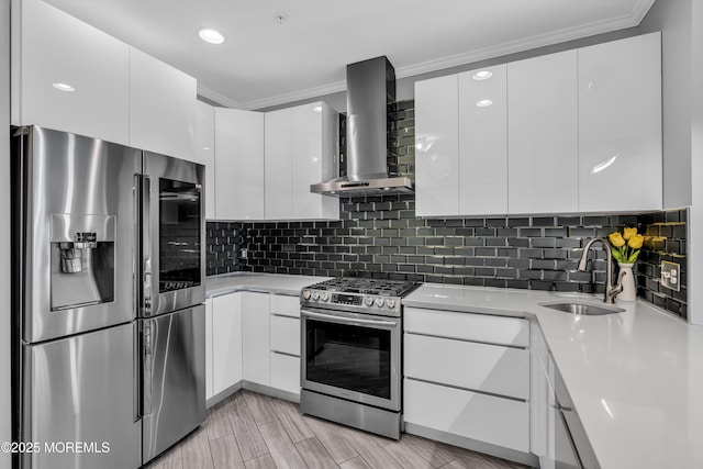 7 Samantha Dr, Tinton Falls, NJ 07712 - kitchen featuring appliances with stainless steel finishes, a sink, wall chimney exhaust hood, modern cabinets, and light countertops