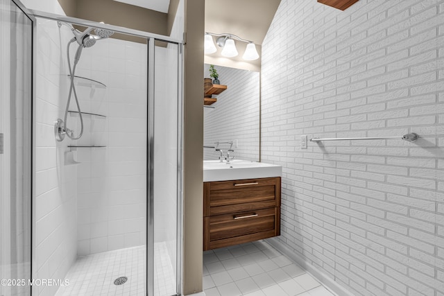 7 Samantha Dr, Tinton Falls, NJ 07712 - full bath featuring a shower stall, brick wall, tile patterned floors, and vanity