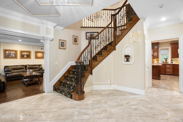 821 Woodland Dr, Lakewood, NJ 08701 - stairway with ornamental molding, baseboards, and decorative columns