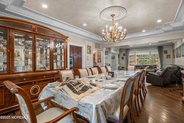 821 Woodland Dr, Lakewood, NJ 08701 - dining room featuring a chandelier, crown molding, dark wood-type flooring, and recessed lighting